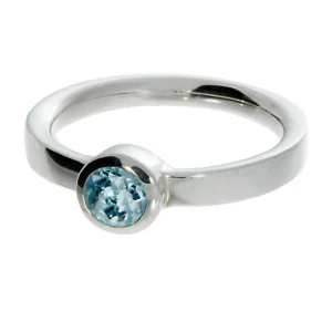 Triangel Ring si blauer Topas 5 mm rund fac